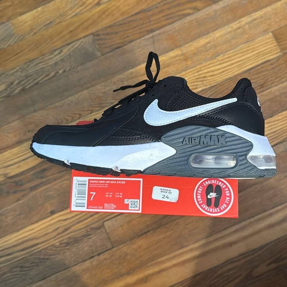 Nike Air Max Emcee sneakers.